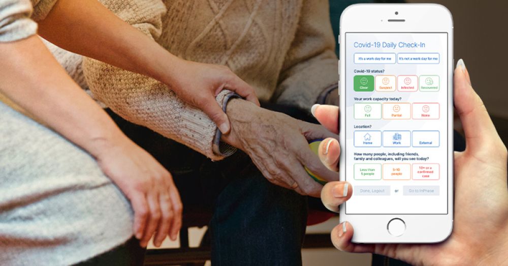 someone holding the inphase staff well being crisis app on an iphone