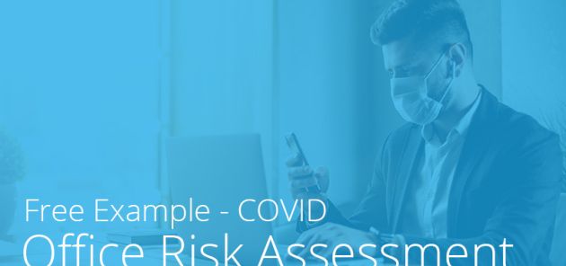 man at laptop for covid risk assessment