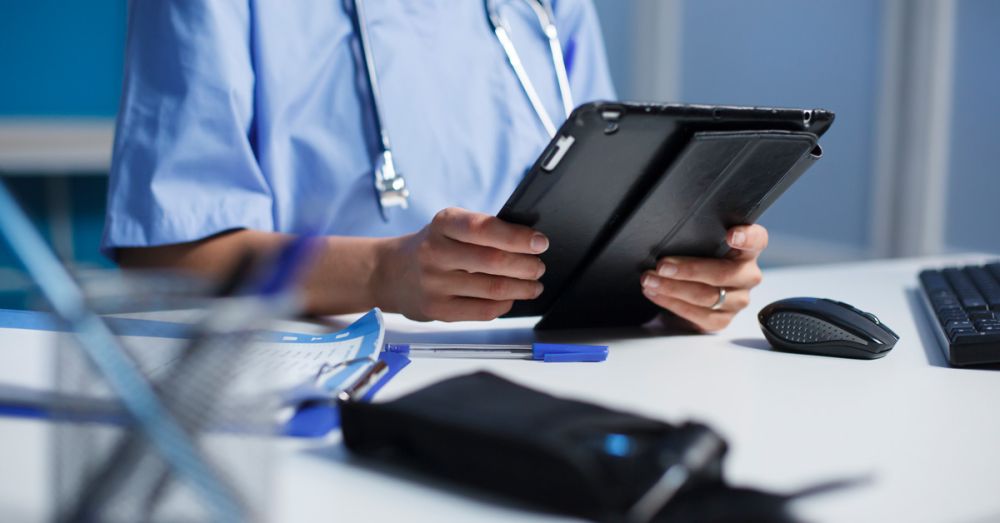 nurse with ipad